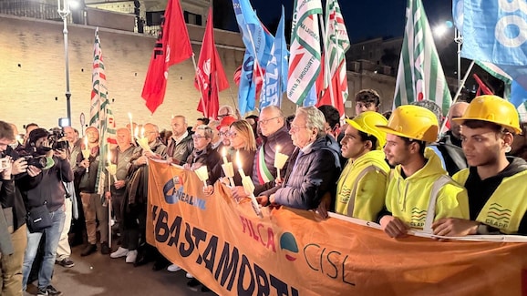 torchlight procession for deaths at work