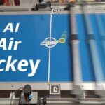 An unbeatable air hockey robot challenges humans in real life: how AI learned to play