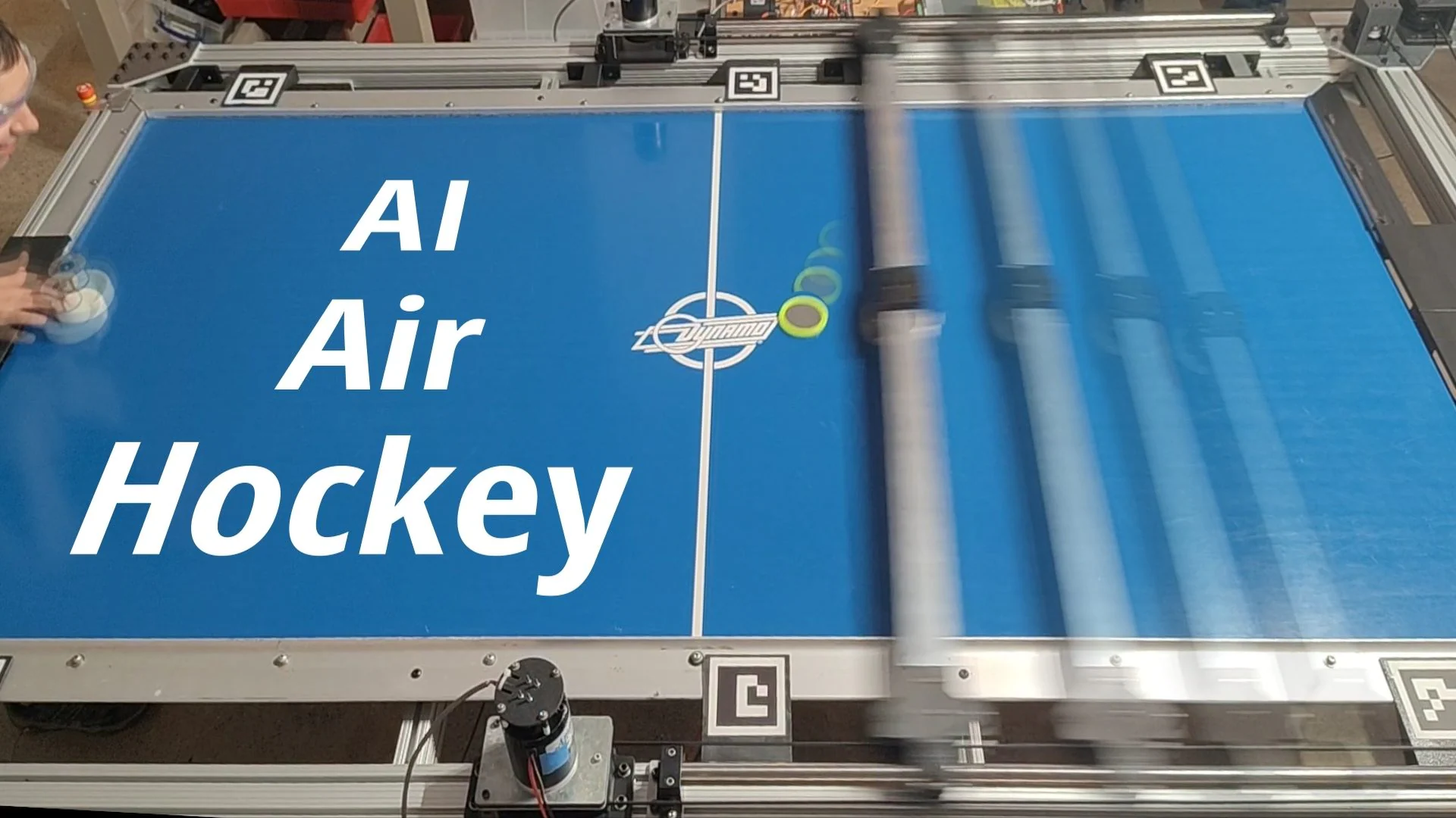 An unbeatable air hockey robot challenges humans in real life: how AI learned to play