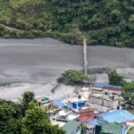 New flood in Nepal: sudden flood with mud flow overwhelms a village